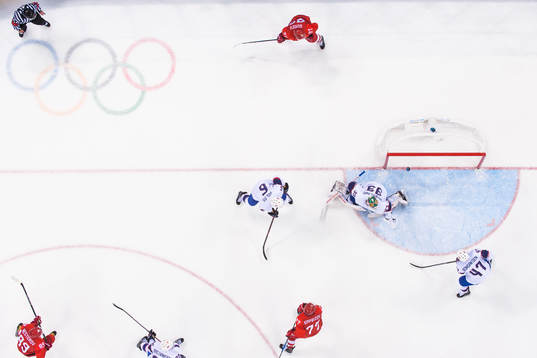 Goaltender Henrik Haukeland of Norway lets in the 5-1 goal
