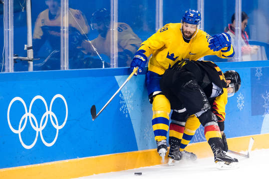Dick Axelsson of Sweden and Patrick Hager of Germany  in