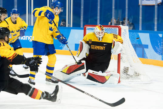 Pär Lindholm of Sweden and Goalkeeper Danny aus