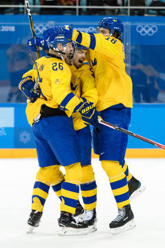 Rasmus Dahlin, Anton Lander and Dennis Everberg of Sweden