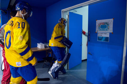 Joakim Lindström of Sweden and Goaltender Viktor Fasth of