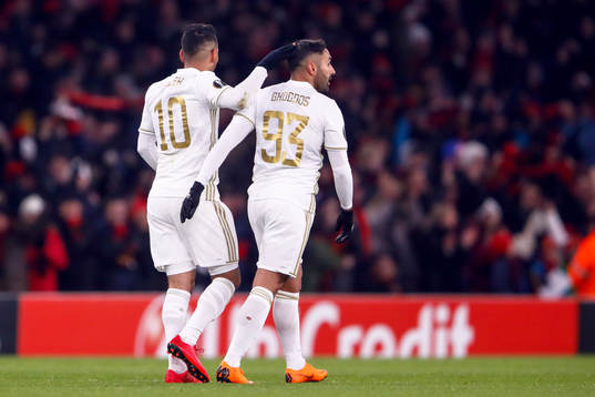 Östersunds Hosam Aiesh och Saman Ghoddos jublar