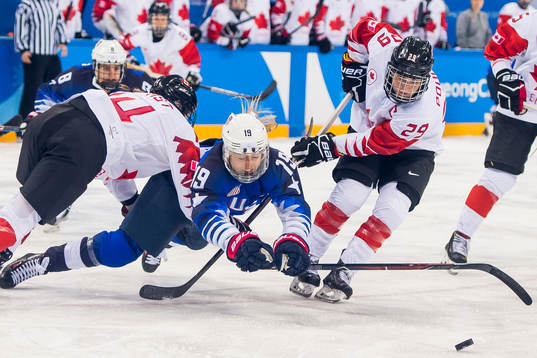 Renata Fast of Canada, Gigi Marvin of USA and Marie-Philip