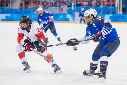 Brianna Decker of USA and Emily Clark of Canada