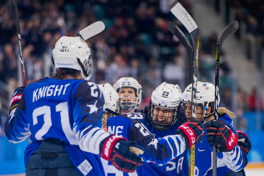 Hilary Knight of USA celebrates with her teammates Sidney