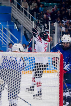 Marie-Philip Poulin of Canada celebrates the 2-1  goal