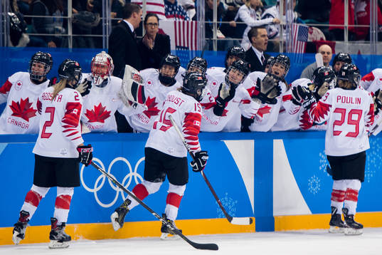 Meghan Agosta, Melodie Daoust and Marie-Philip Poulin of