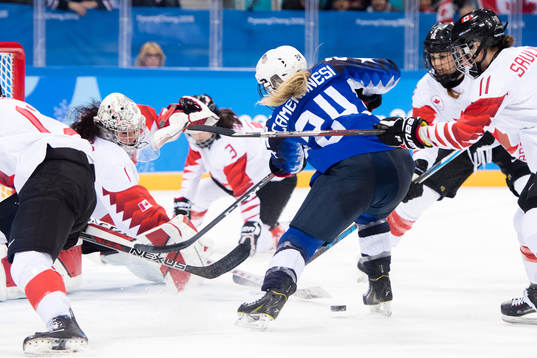 Dani Camoranesi of USA and Goalkeeper Shannon Szabados of