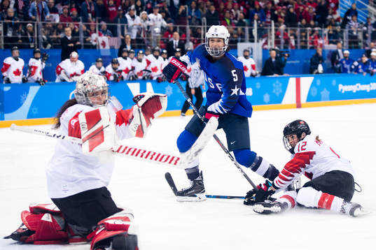 Megan Keller of USA against Goalkeeper Shannon Szabados and