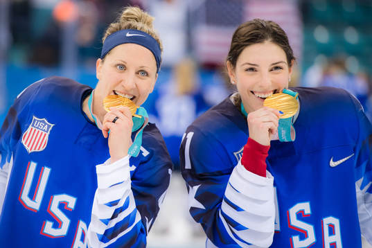 Meghan Duggan and Hilary Knight of USA celebrates