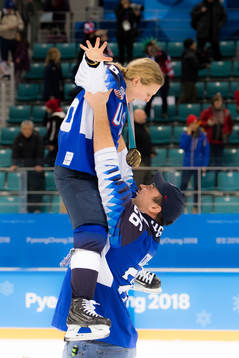 Kendall Coyne of USA celebrates with her boyfriend
