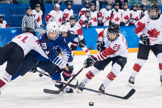 Gigi Marvin of USA in action with Renata Fast of Canada and