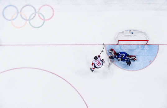 Goaltender Maddie Ronney of USA saves a penalty from