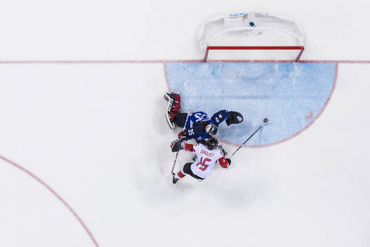 Melodie Daoust of Canada against Goaltender Maddie Ronney
