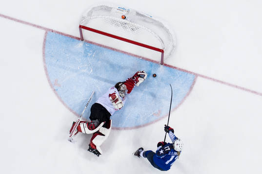 Jocelyne Lamoureux Davidson of USA scores against