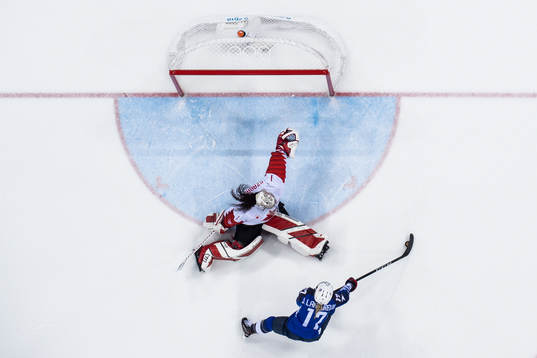 Jocelyne Lamoureux Davidson of USA scores against