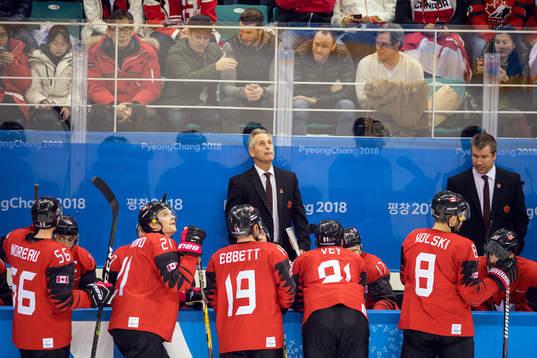 Canada's head coach Willie Desjardins looks dejected in the