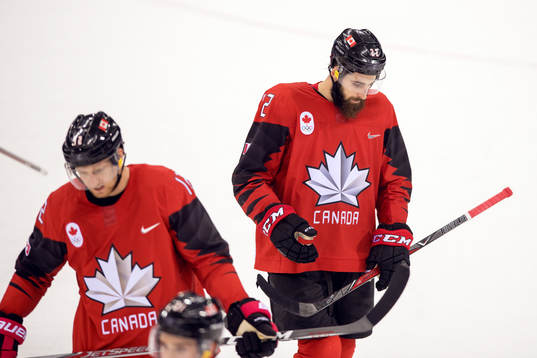 Eric O'Dell and Rob Klinkhammer of Canada looks dejected