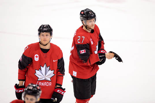Karl Stollery and Cody Goloubef of Canada looks dejected