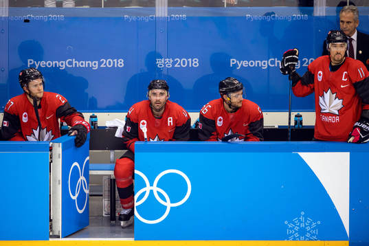 Cody Goloubef, Chris Lee and Maxim Noreau of Canada looks