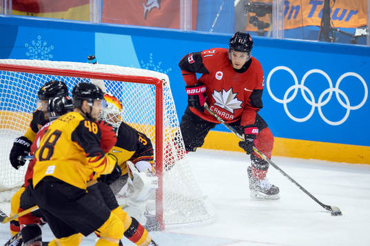 Mason Raymond of Canada and goalkeeper Danny aus