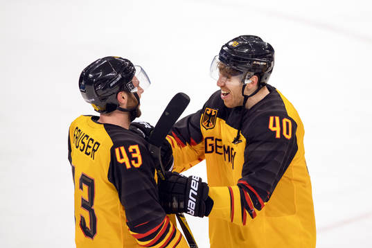 Gerrit Fauser and Björn Krupp of Germany celebrate