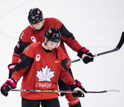 Mason Raymond of Canada looks dejected
