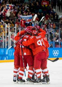 Vyacheslav Voinov of Russia (OAR) celebrates with teammates