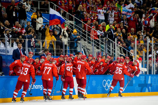 Vyacheslav Voinov of Russia (OAR) celebrates with teammates