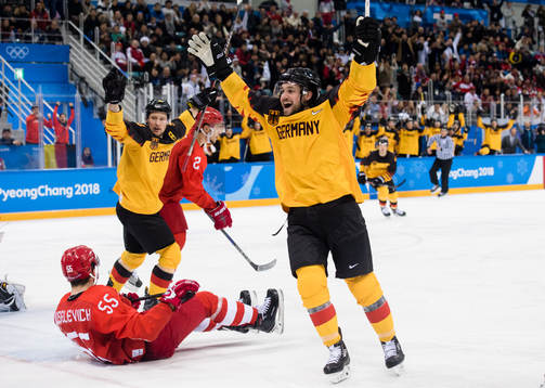 Patrick Hager and Brooks Macek of Germany celebrates the