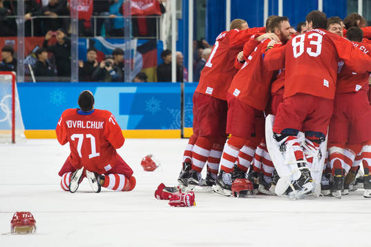 Players of Russia (OAR) celebrates winning the Ice Hockey