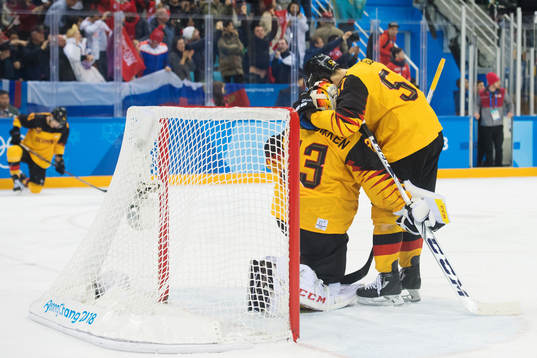 Marcel Goc comforts his teammate goalkeeper Danny aus