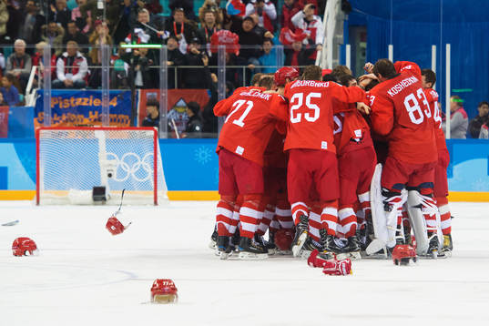Players of Russia (OAR) celebrates winning the Ice Hockey