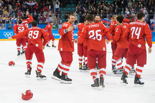 Players of Russia (OAR) celebrates winning the Ice Hockey