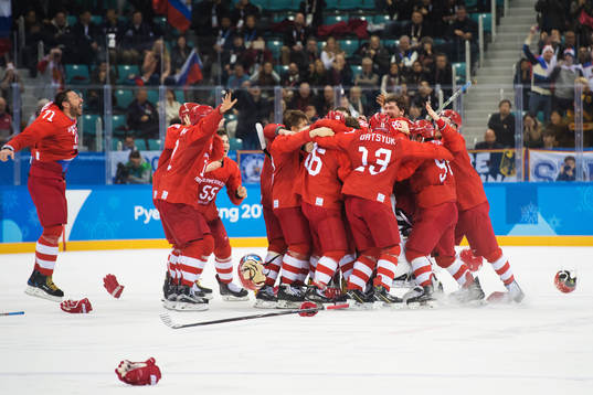 Players of Russia (OAR) celebrates winning the Ice Hockey