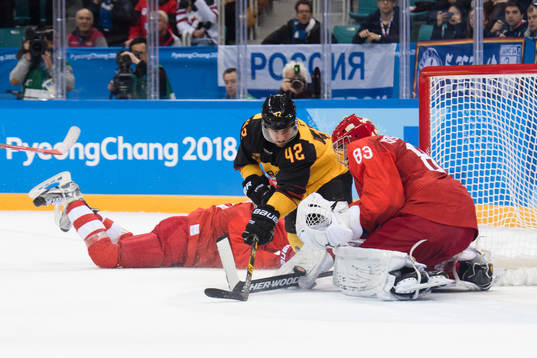 Yasin Ehliz of Germany and Goalkeeper Vasili Koshechkin Of