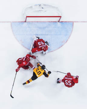 Patrick Hager of Germany against goaltender Vasili