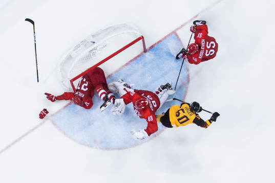 Patrick Hager of Germany against goaltender Vasili