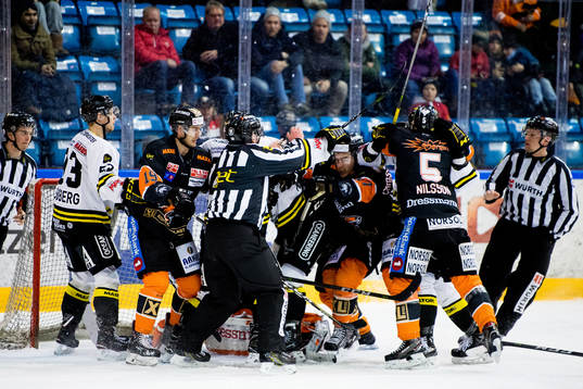 Players of Frisk Asker and Stavanger Oilers fight