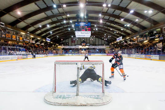 Goaltender Henrik Holm of Stavanger Oilers saves the