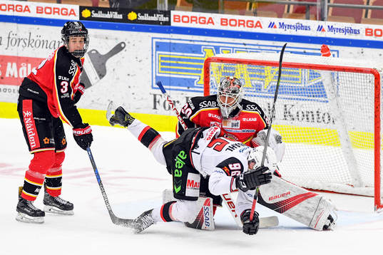 Malmö Redhawks Kim Rosdahl och Luleås Nils Lundkvist och