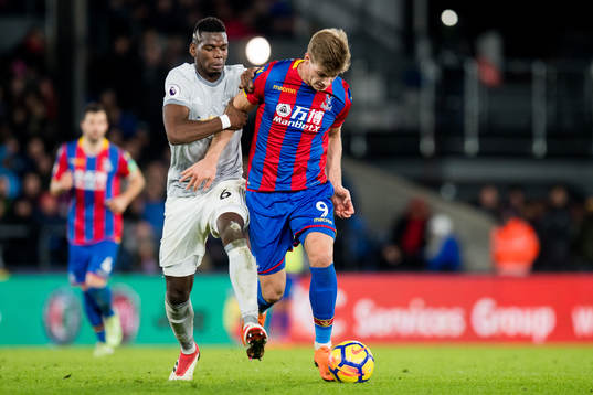 Paul Pogba of Manchester United and Alexander Sørloth of
