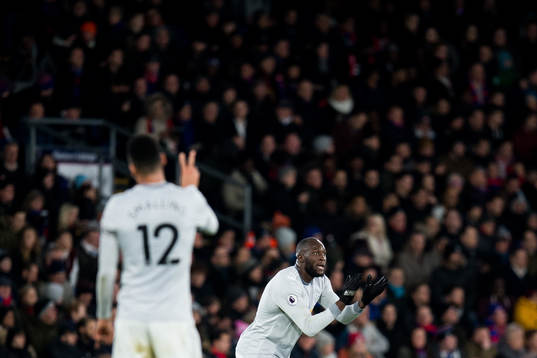 Chris Smalling of Manchester United and Romelu Lukaku of