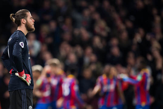 Goalkeeper David de Gea of Manchester United looks dejected