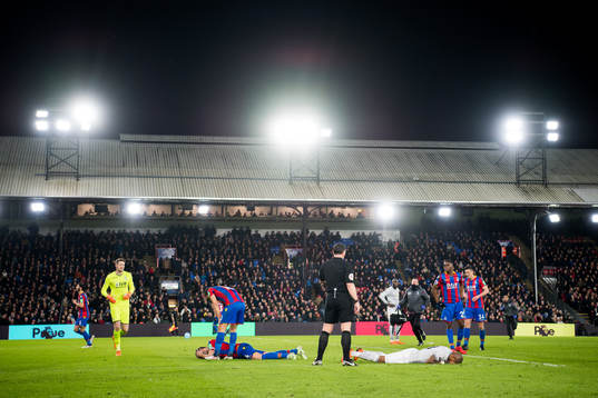Luka Milivojevic of Crystal Palace and Chris Smalling of