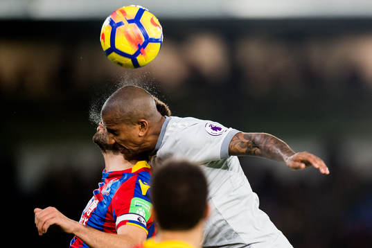 Luka Milivojevic of Crystal Palace and Chris Smalling of