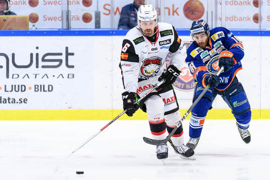 Malmö Redhawks Stefan Warg och Växjös Andrew Calof