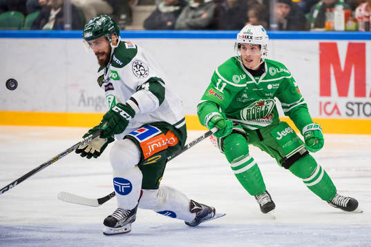 Färjestads Morgan Ellis och Rögles Bryan Lerg