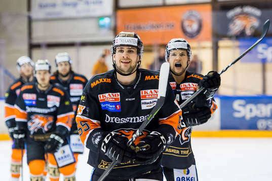 Endre Medby of Frisk Asker celebrates with his teammates