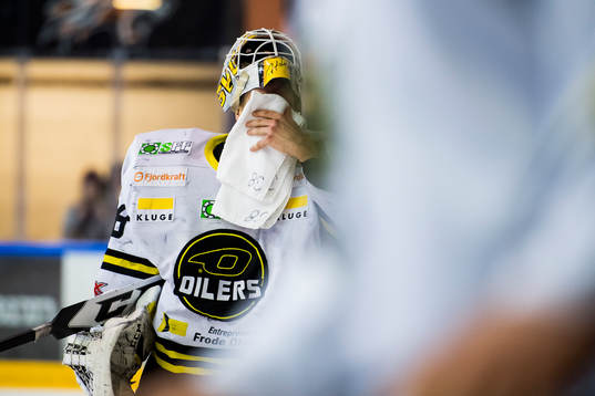 Goaltender Henrik Holm of Stavanger Oilers looks dejected